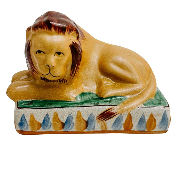 Pair Of Staffordshire Style Recumbent Lion Figurines